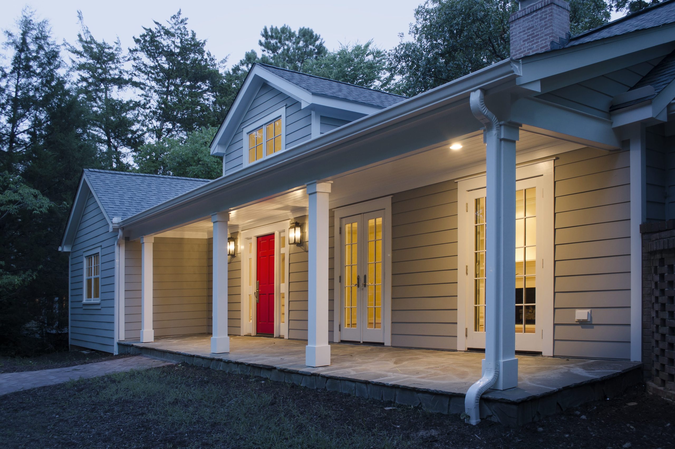 A exterior view captures the charming yet sophisticated cottage feel