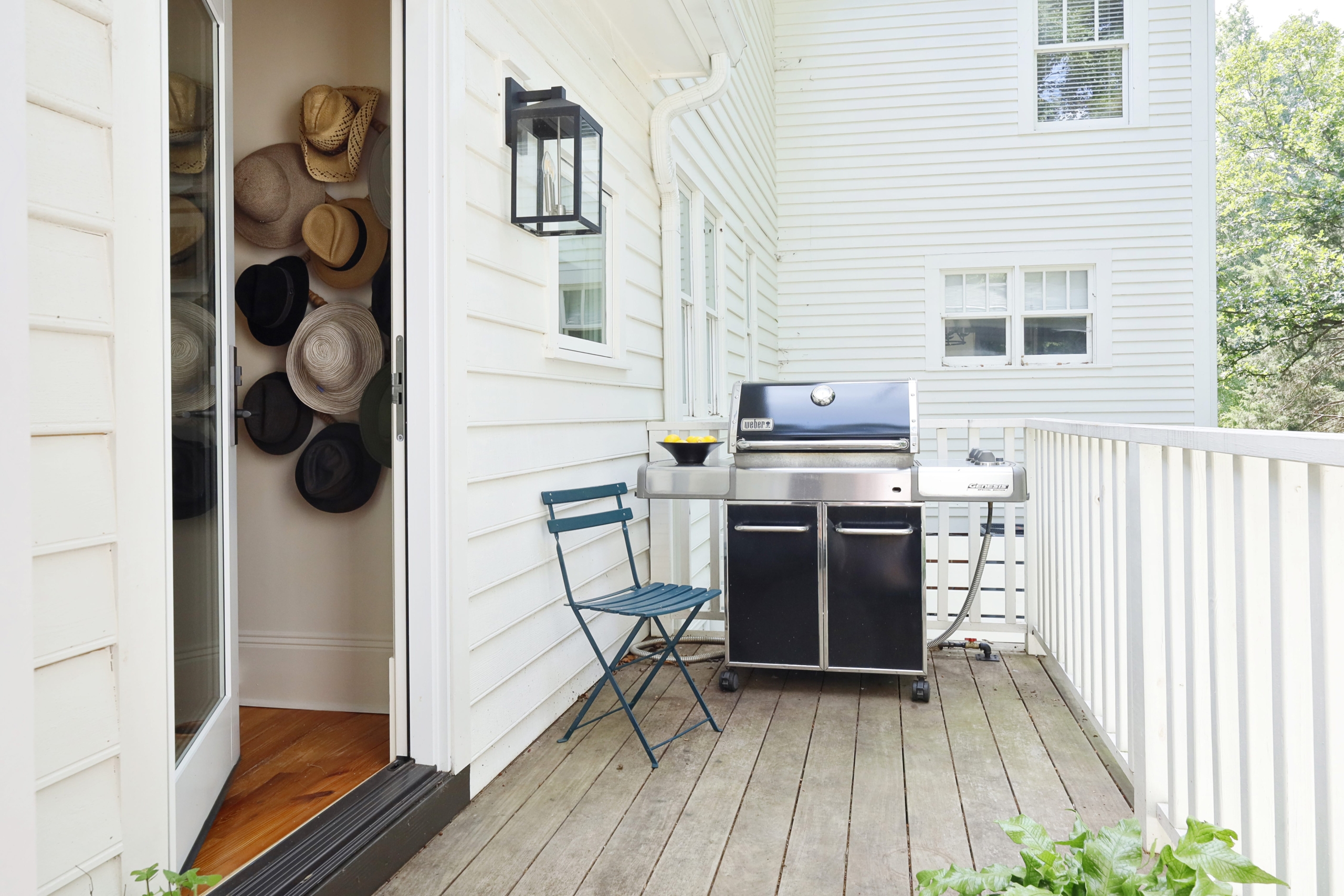 A small deck off the primary suite for grilling, lounging and admiring the surrounding nature