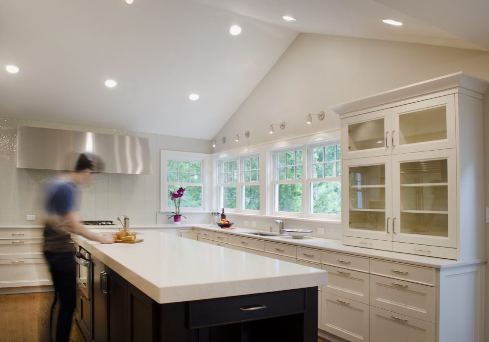This light-filled kitchen with a generous island, built-in storage and vaulted ceilings is the perfect space for both casual cooking and gourmet dining and hosting